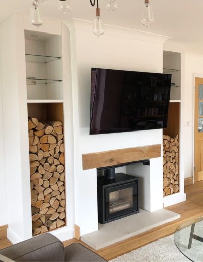 Fitted Alcove Display and Log Store. Finished in Ice White