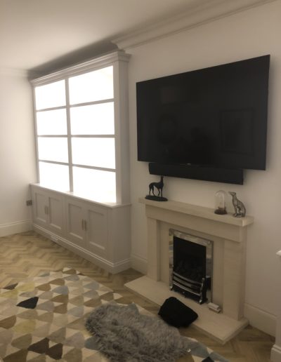 Fitted Alcove Unit. Finished in Ice White with LED Lights