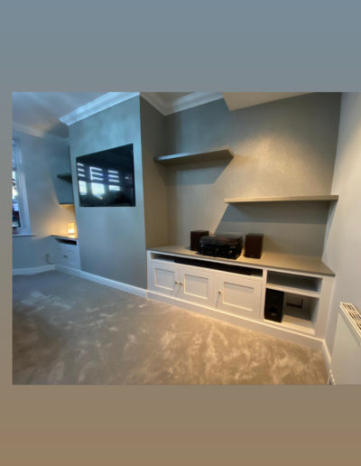 Fitted Alcove Units. Painted finishe with Oak Tops & Shelving Above