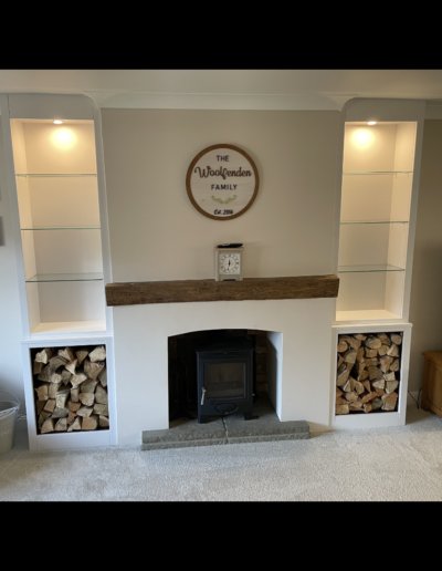 Fitted Alcove Display and Log Store. Finished in Ice White