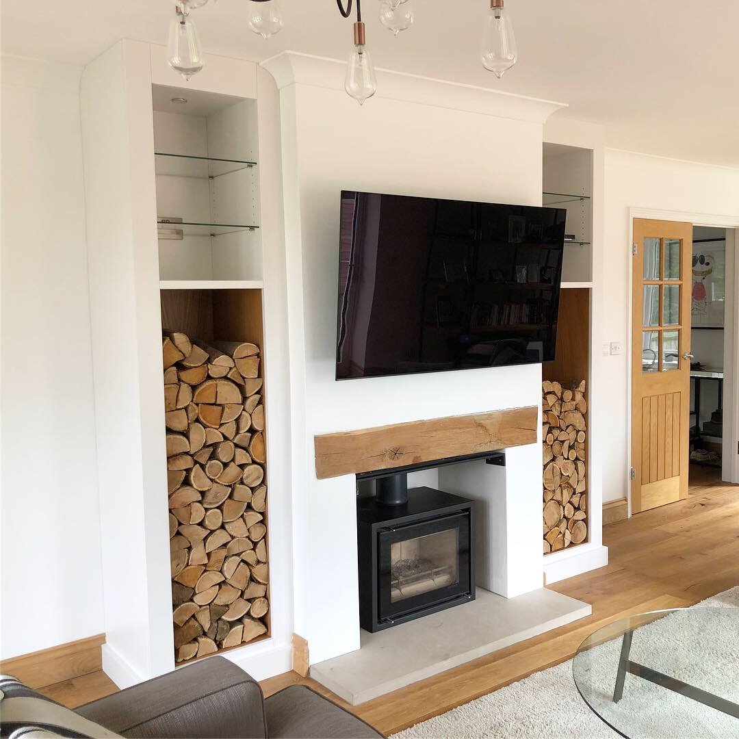 Fitted Alcove Display and Log Store. Finished in Ice White