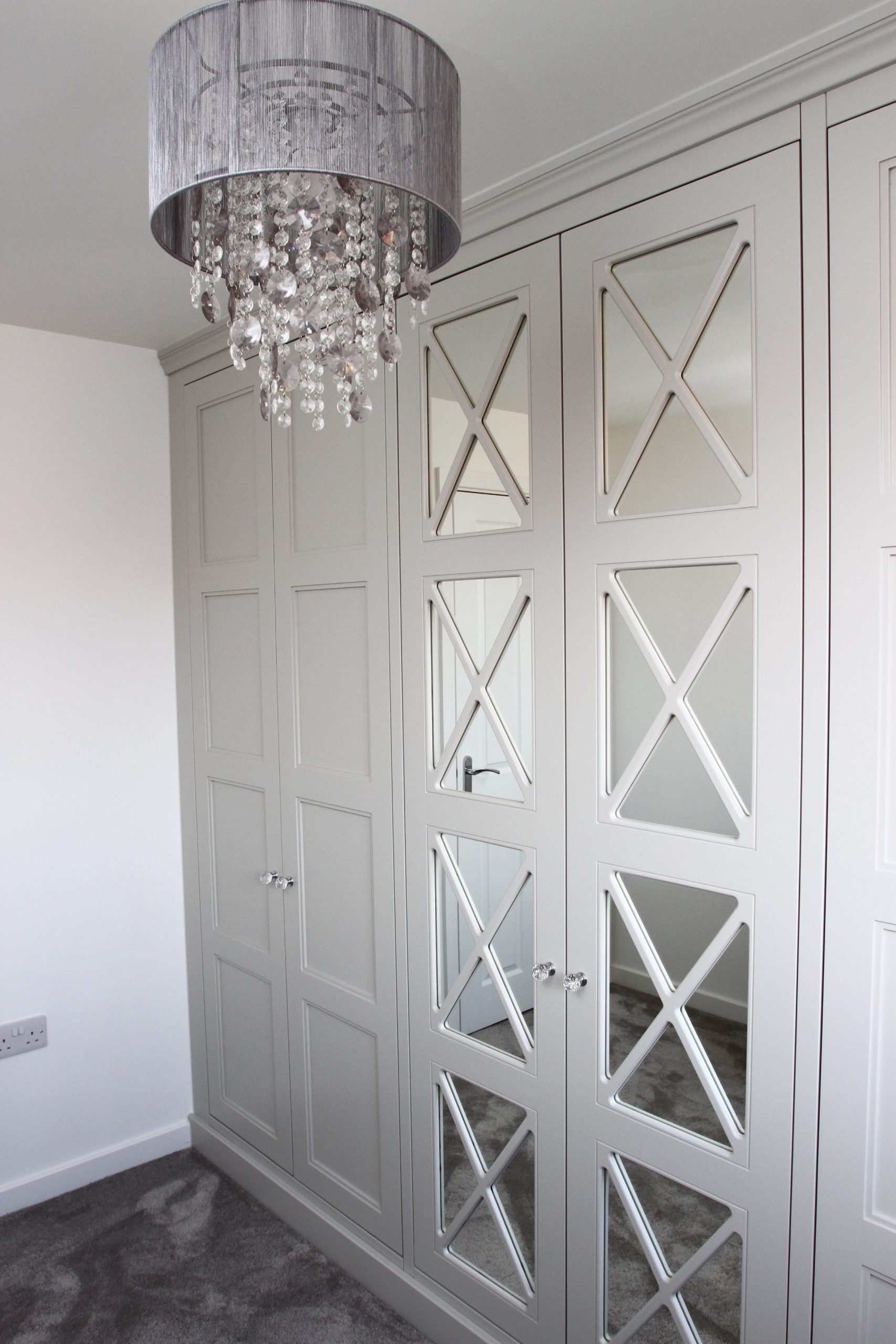 Fitted Wardrobe with Fret mirrored Fitted mirror wardrobes by Priest Brothers Chelmsford