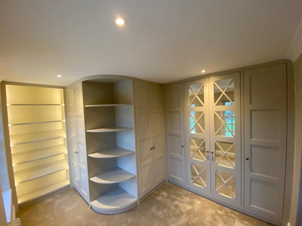 Walk-in wardrobe with shoe display unit & open glass display section