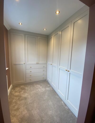 Shaker style dressing-room fit, oak internals finished in Farrow & Ball skimming stone