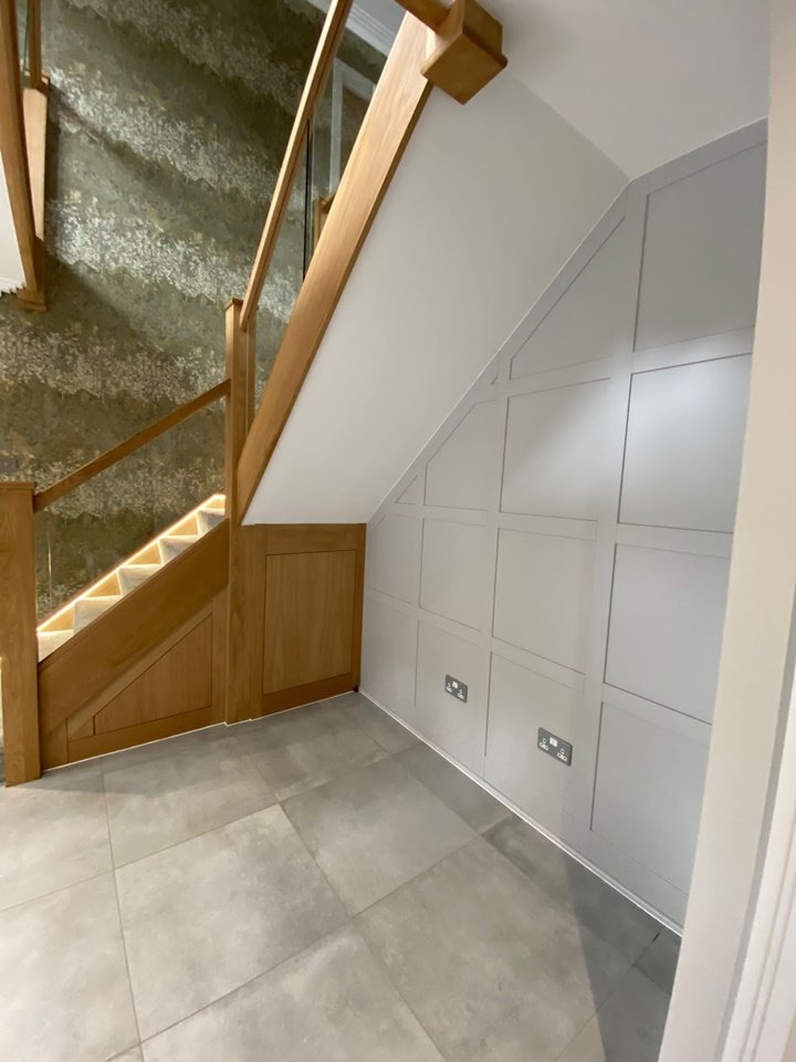 oak understairs cupboards to match the stairs & panelled wall in Farrow & Ball cornforth white