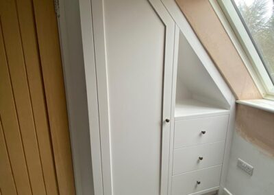 wardrobe built into eaves
