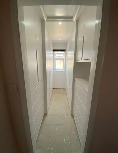 Custom-made dressing room to maximise the storage in the space available