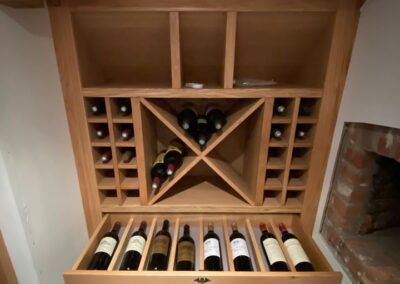 Unique wine rack with lined wine drawer and recessed LED Lights