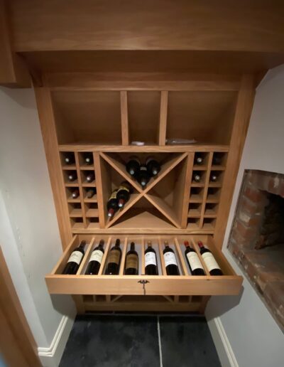 Unique wine rack with lined wine drawer and recessed LED Lights