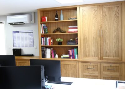 business office desk and book shelves