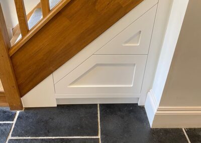 Unique under stairs shoe storage