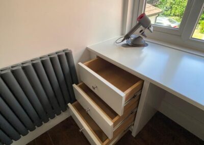 Corner chest of drawers and dressing table with oak interiors