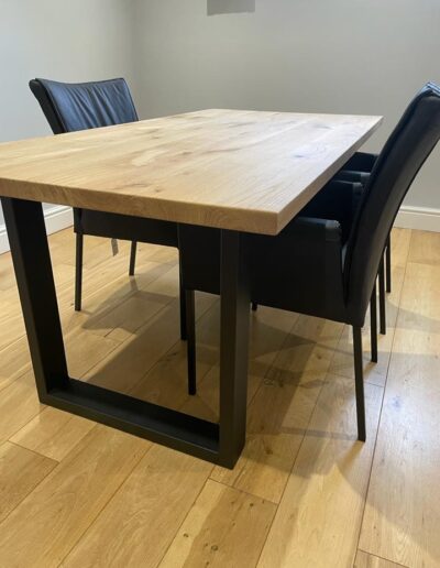Bespoke solid oak dining table with industrial legs & coordinating chairs