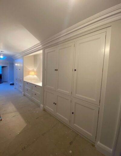 Bespoke 6m shaker style storage unit finished in Farrow & Ball Strong white paint