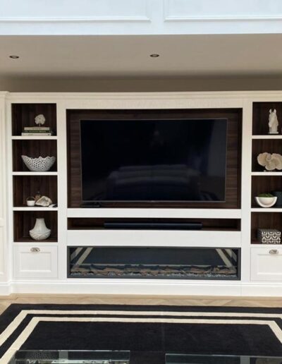 Bespoke media unit with TV, sound bar and plasma fire surround