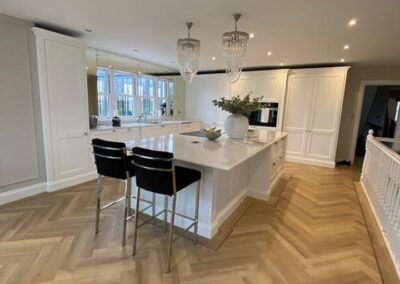 Complete kitchen fit shaker style detailed units, Calcutta gold quartz worktop, walnut internals finished in brilliant white paint