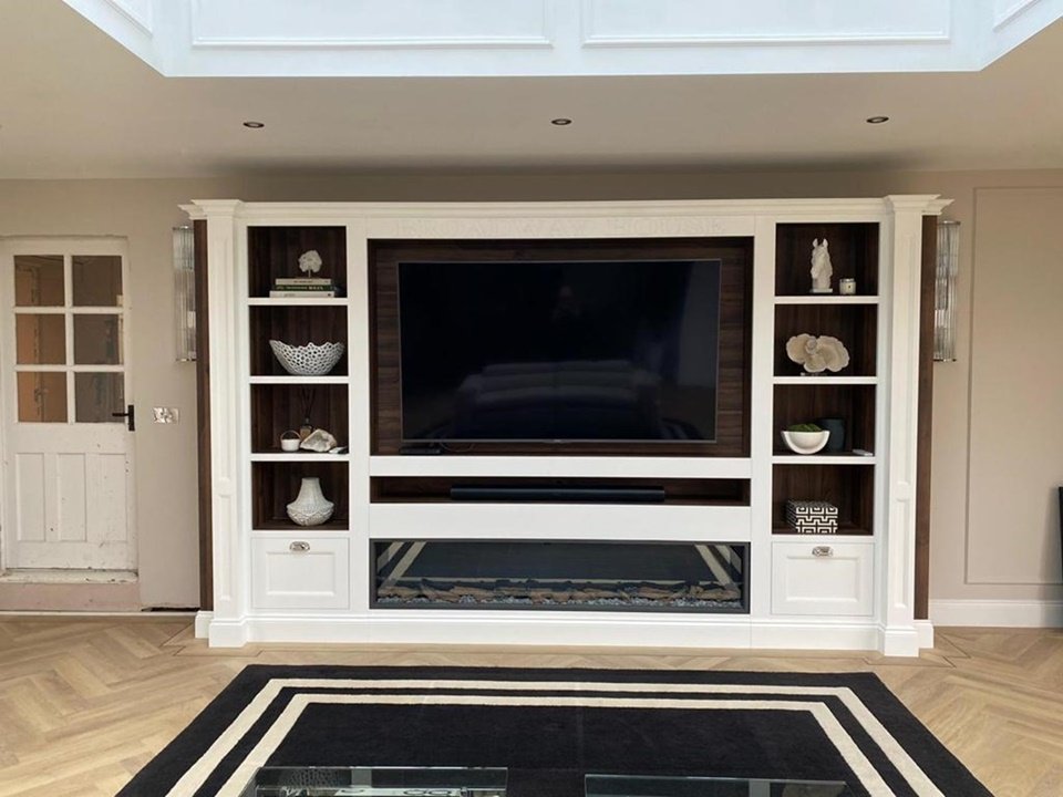 Bespoke media unit with TV, sound bar and plasma fire surround