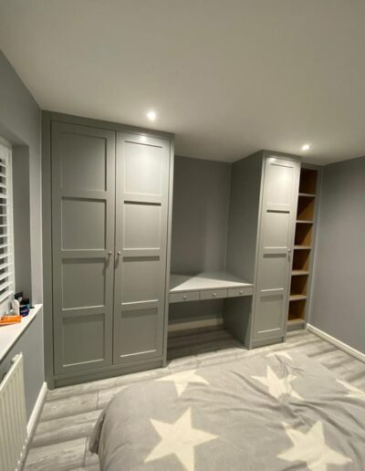 Bespoke 4 panel shaker style child’s fitted wardrobe with internal mirror, oak internals finished in natural stone
