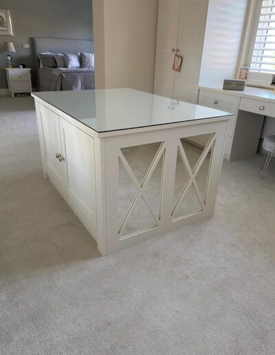 Bespoke 1400x1000mm island unit with fret mirrored sides, glass top, oak internals & colour matched paint to their present furniture