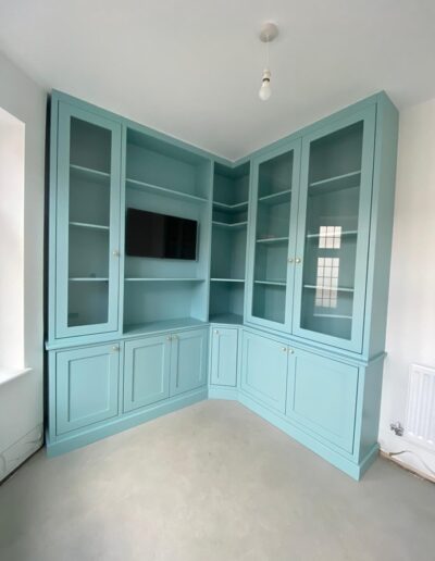 Unique office unit with mounted TV, feature glass doors, oak internals, soft close openings finished in Farrow and Ball blue ground paint