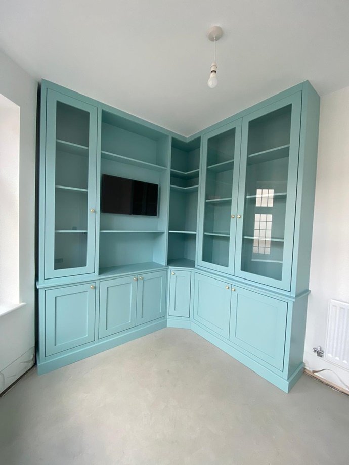Unique office unit with mounted TV, feature glass doors, oak internals, soft close openings finished in Farrow and Ball blue ground paint