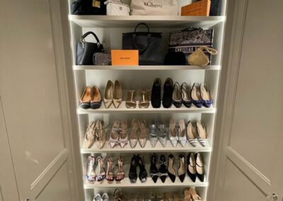 Open glass shoe display unit with LED strip lights