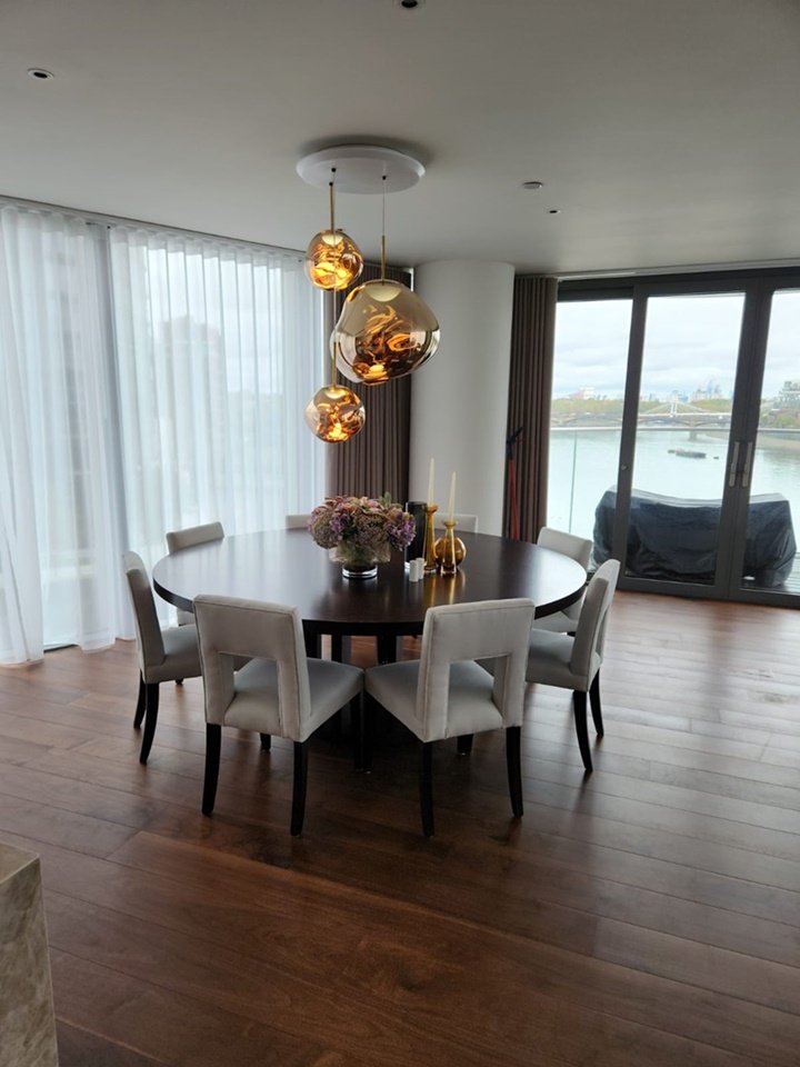 Bespoke table made in our onsite workshop with a 2-metre round by 50mm thick top on pedestal base, finished in wenge dark oak