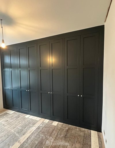 Shaker-style 3-panel full height fitted wardrobes with oak internals finished in Farrow & Ball Railings
