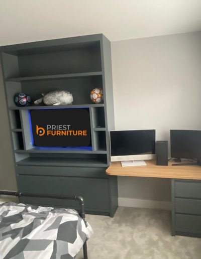 Media unit in a modern handle-less finish, sprayed in Downpipe by Farrow & Ball
