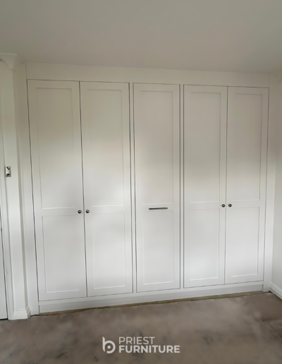 Bespoke fitted Shaker-style wardrobe in Ice White