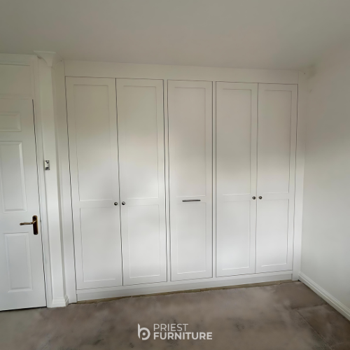 Bespoke fitted Shaker-style wardrobe in Ice White