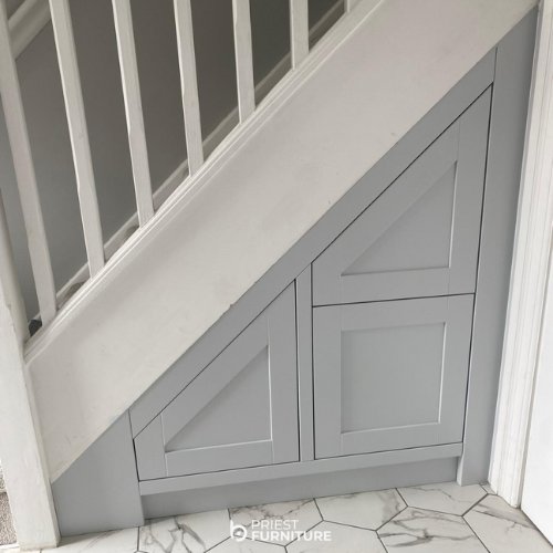 Bespoke understairs storage sprayed to colour match existing kitchen